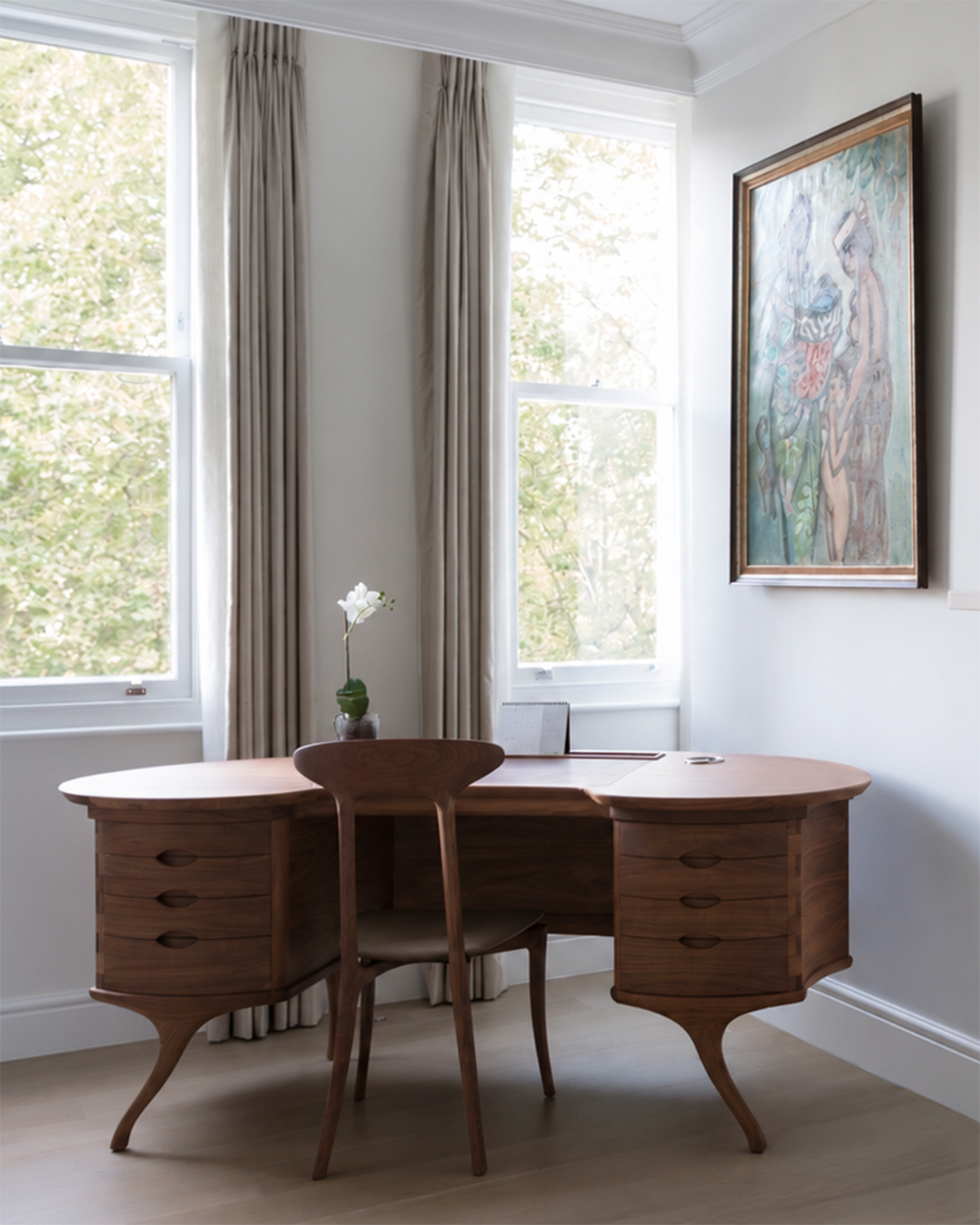 A walnut desk and chair in the Stanhope Gardens study.
